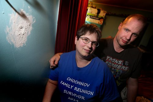 JOHN WOODS / WINNIPEG FREE PRESS Carrie and Shawn Ryland are photographed with a patched bullet hole in the bedroom wall of their trailer home Monday, May 9, 2016.