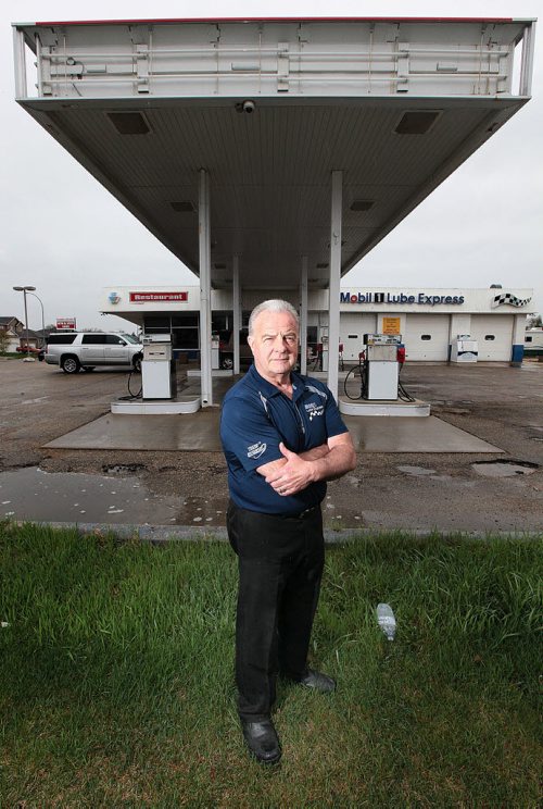 PHIL HOSSACK / WINNIPEG FREE PRESS -  Jeff Kendel poses in front of the signless canopy at his corner gas and service station at McLeod and Molsen Tuesday. See Kelly Taylor feature. May 10, 2016