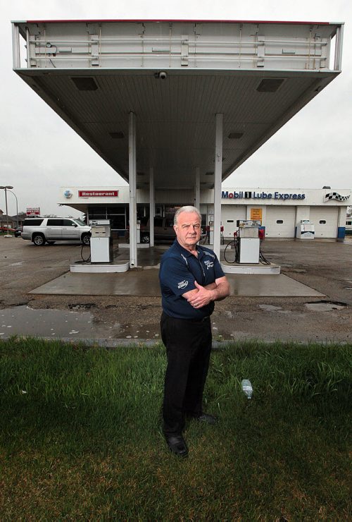 PHIL HOSSACK / WINNIPEG FREE PRESS -  Jeff Kendel poses in front of the signless canopy at his corner gas and service station at McLeod and Molsen Tuesday. See Kelly Taylor feature. May 10, 2016