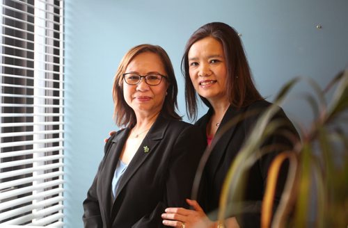 RUTH BONNEVILLE / WINNIPEG FREE PRESS   Portrait of  Stephanie Stobbe (right)  and her mom, Pinkham Sharp, at Menno Simon's College.  Story on up coming conference and  how they fled Laos and was plopped down in rural Manitoba in 1979.  Carol Sanders  | Reporter May 10, , 2016