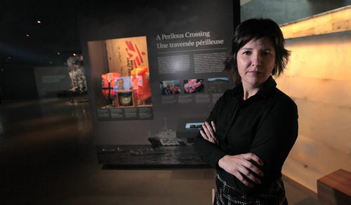PHIL HOSSACK / WINNIPEG FREE PRESS -  Isabelle Masson, a CMHA Curator who adapted the Medicine Sans Frontieres exhibit for The Canadian Human RIghts Museum poses in front of the display Wednesday. The exhibit opens Thursday. See release / story.  May 10, 2016