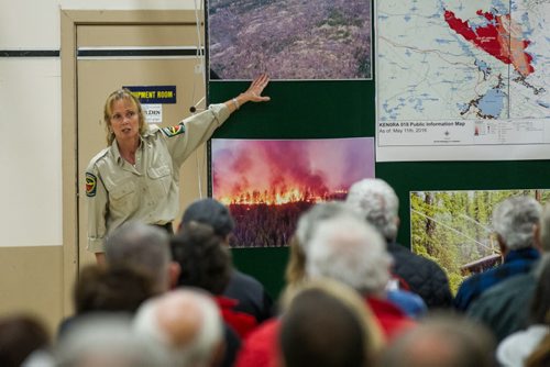 MIKE DEAL / WINNIPEG FREE PRESS Marney Brown, Incident Commander with the Ontario Ministry of Natural Resources and Forestry talks to area residents who gathered at the Whitehall Community Hall in Falcon Lake for an information meeting put together by Manitoba and Ontario fire officials for those affected by the Caddy Lake fire Thursday evening. 160512 - Thursday, May 12, 2016