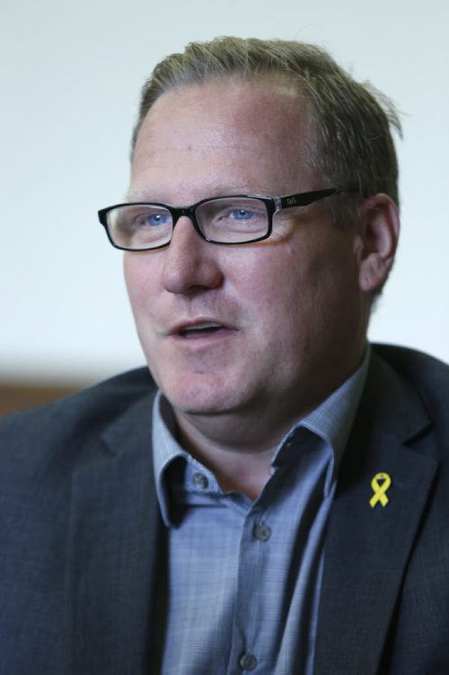 WAYNE GLOWACKI / WINNIPEG FREE PRESS   Scott Fielding, Minister of Families (MLA for Kirkfield Park) in his office in the Manitoba Legislative Bld. Larry Kusch  story  May 13  2016