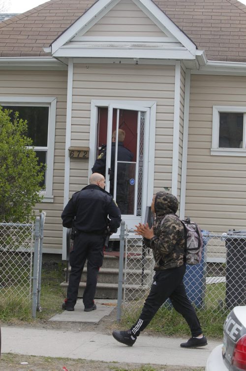 BORIS MINKEVICH / WINNIPEG FREE PRESS Crime scene at 672 Wellington Ave. Police come back to the scene to secure the building. May 13, 2016.