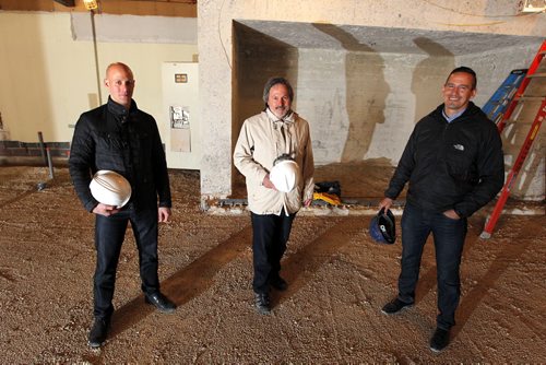 BORIS MINKEVICH / WINNIPEG FREE PRESS Cibinel Architects is moving into the old Comics America space on Academy Road with a seven-figure investment. George Cibinel, centre, is the main principal. His two partners Mike Robertson, right, and Michael Acht, left, are in the photo too. May 13, 2016.