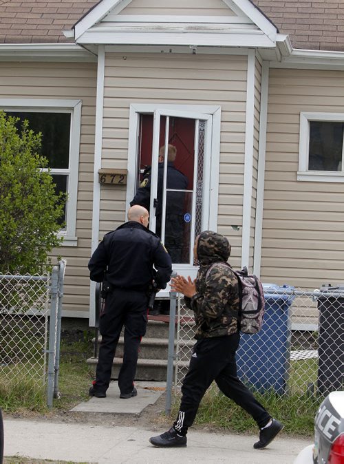 BORIS MINKEVICH / WINNIPEG FREE PRESS Crime scene at 672 Wellington Ave. Police come back to the scene to secure the building. May 13, 2016.