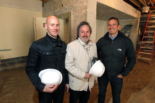 BORIS MINKEVICH / WINNIPEG FREE PRESS Cibinel Architects is moving into the old Comics America space on Academy Road with a seven-figure investment. George Cibinel, centre, is the main principal. His two partners Mike Robertson, right, and Michael Acht, left, are in the photo too. May 13, 2016.