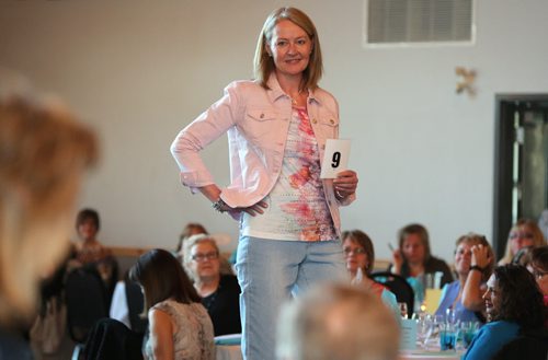 JASON HALSTEAD / WINNIPEG FREE PRESS  Model Diana McMillan shows off clothes at the fourth annual Hope Springs Into Fashion fundraiser for Ovarian Cancer Canada research at St. Boniface Golf Club on April 28, 2016. (See Social Page)