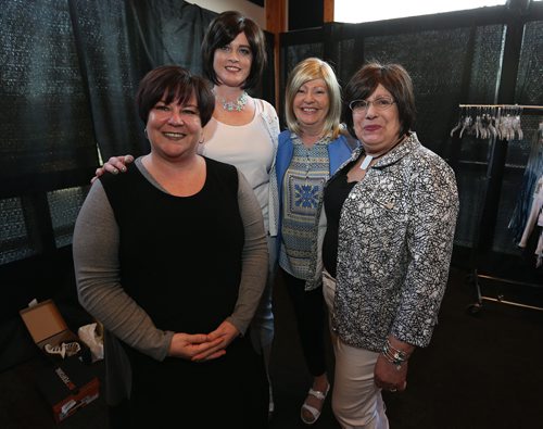 JASON HALSTEAD / WINNIPEG FREE PRESS  L-R: Deb McMillin, wig specialist and co-owner of City Looks Salon, Spa and Wig Centre, with models Kendra Dubois, Laura Carr and Yvonne Groshak  at the fourth annual Hope Springs Into Fashion fundraiser for Ovarian Cancer Canada research at St. Boniface Golf Club on April 28, 2016. (See Social Page)