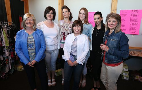 JASON HALSTEAD / WINNIPEG FREE PRESS  L-R: Models Laura Carr, Kendra Dubois, Frances Matlock, Christine Bateman, Amanda Borden, Judy Ramore and (front) Cheryl Franz at the fourth annual Hope Springs Into Fashion fundraiser for Ovarian Cancer Canada research at St. Boniface Golf Club on April 28, 2016. (See Social Page)