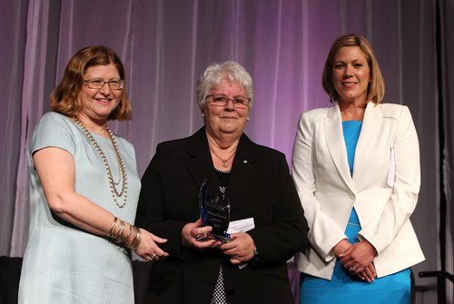 JASON HALSTEAD / WINNIPEG FREE PRESS  Marlene Bertrand receives the Eira 'Babs' Friesen Lifetime Achievement Award from YMCA-YWCA board chair Catherine Thiessen (left) and Rochelle Squires (right), Manitoba's Minister of minister of Sport, Culture and Heritage at the 40th annual YMCA-YWCA Women of Distinction Awards Gala on May 4, 2016 at the RBC Convention Centre Winnipeg. The awards celebrate the talent, achievements, imagination and innovation of Manitoban women. Proceeds from the gala support programs that positively impact the lives of women, youth and children in Winnipeg. (For Social Page)