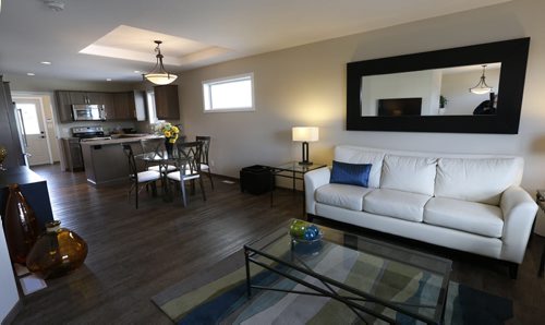 WAYNE GLOWACKI / WINNIPEG FREE PRESS      Homes.  140 Prairie Crocus Drive in Crocus Meadows. The open main floor with living room, dining area and kitchen .Todd Lewys   story  May 16  2016