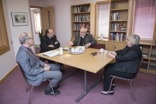 DAVID LIPNOWSKI / WINNIPEG FREE PRESS  (L-R) Bishop Donald Philips, Archbishop Albert LeGatt, Archbishop Lawrence Huculak, and Bishop Elaine Sauer converse at Ephiphany Lutheran Church Tuesday May 17, 2016. The Winnipeg Bishops from various denominations (Lutheran, Anglican, Catholic, Orthodox) get together to discuss common concerns over lunch.