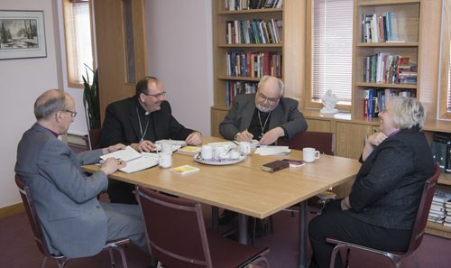 DAVID LIPNOWSKI / WINNIPEG FREE PRESS  (L-R) Bishop Donald Philips, Archbishop Albert LeGatt, Archbishop Lawrence Huculak, and Bishop Elaine Sauer converse at Ephiphany Lutheran Church Tuesday May 17, 2016. The Winnipeg Bishops from various denominations (Lutheran, Anglican, Catholic, Orthodox) get together to discuss common concerns over lunch.