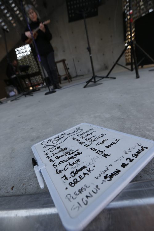 JOHN WOODS / WINNIPEG FREE PRESS The sign up board sits on the stage as Linda performs at Caravan, an open mic event at Old Market Square, Monday, May 16, 2016.