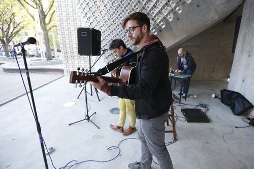 JOHN WOODS / WINNIPEG FREE PRESS Brendan and Dave perform as Paul Little works the soundboard at Caravan, an open mic event at Old Market Square, Monday, May 16, 2016.