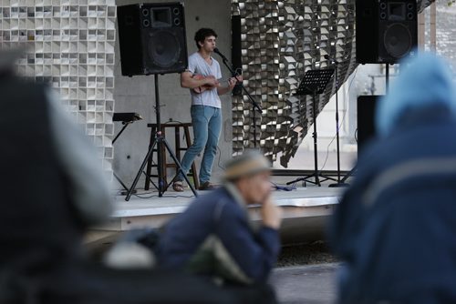 JOHN WOODS / WINNIPEG FREE PRESS Justin performs at Caravan, an open mic event at Old Market Square, Monday, May 16, 2016.