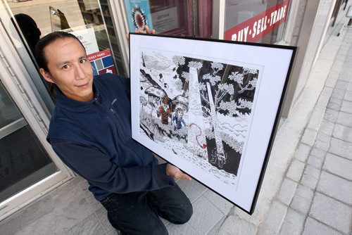 JOE BRYKSA / WINNIPEG FREE PRESS Art project in downtown Winnipeg- Proclaimed as the Year of Reconciliation by Mayor Brian Bowman, this new initiative seeks to promote Indigenous culture and traditions to both Indigenous and non-Indigenous people. Kevin Anderson, 41 yrs hangs his art in the Portage Book Fair 340 Portage Ave, May 17 , 2016.(see Bill Redekop story story)