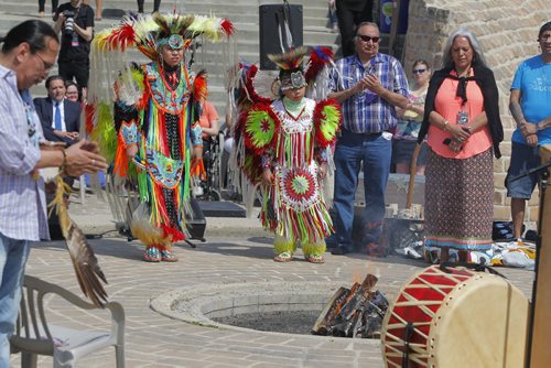 BORIS MINKEVICH / WINNIPEG FREE PRESS Brenden Patrick, 14, and his brother Cole Patrick, 9, from Roseau River Anishinabe First Nation participate in the opening the Kick-Off of the 2016 Manito Ahbee Festival at Oodena Circle at The Forks. May 18, 2016.
