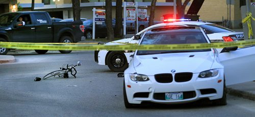 PHIL HOSSACK / WINNIPEG FREE PRESS -  The scene of a car cyclist accident at Wellington and Grosvenor Wednesday night. May 18, 2016