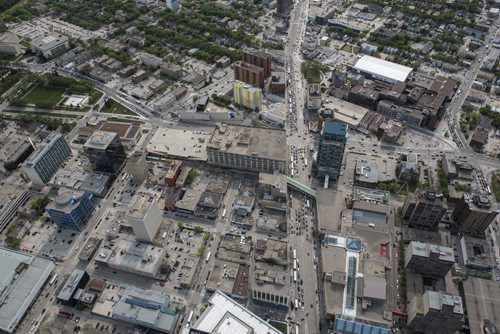 DAVID LIPNOWSKI / WINNIPEG FREE PRESS  Downtown Winnipeg featuring Hudson's Bay Company and The Winnipeg Art Gallery  Aerial photography over Winnipeg May 18, 2016 shot from STARS helicopter.