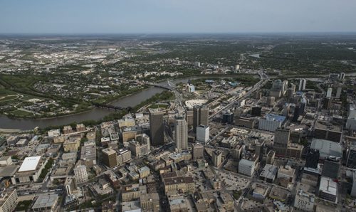 DAVID LIPNOWSKI / WINNIPEG FREE PRESS  Downtown Winnipeg featuring Portage and Main  Aerial photography over Winnipeg May 18, 2016 shot from STARS helicopter.