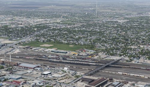 DAVID LIPNOWSKI / WINNIPEG FREE PRESS  Arlington Bridge dividing North/South Winnipeg  Aerial photography over Winnipeg May 18, 2016 shot from STARS helicopter.