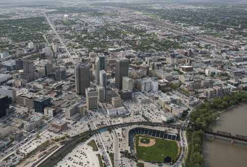 DAVID LIPNOWSKI / WINNIPEG FREE PRESS  Downtown Winnipeg featuring Portage and Main, and Shaw Park  Aerial photography over Winnipeg May 18, 2016 shot from STARS helicopter.
