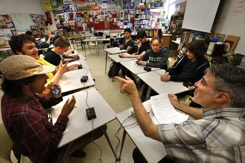 WAYNE GLOWACKI / WINNIPEG FREE PRESS    49.8 Intersection. At right, Raymond Sokalski,  one of the two coaches and quiz master for Kelvin High School Reach for the Top teams practicing over the lunch hour. He is gesturing at Eric Keilback on Kelvin's senior team that is practicing against Kelvin's younger students team at right.   David Sanderson story May 18  2016
