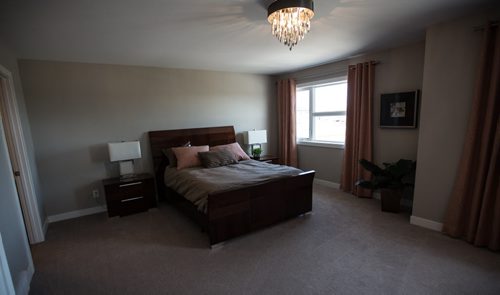 MIKE DEAL / WINNIPEG FREE PRESS 323 Stan Bailie Drive in South Pointe for a New Homes feature. Master bedroom 160519 - Thursday, May 19, 2016