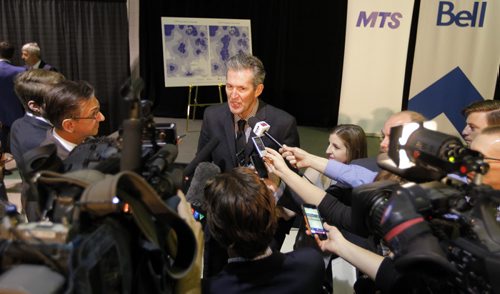 BORIS MINKEVICH / WINNIPEG FREE PRESS Official announcement of cell coverage improvements south of the city on highway 75. Premier Brian Pallister scrums after the presser. May 20, 2016.