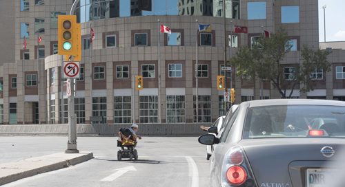 DAVID LIPNOWSKI / WINNIPEG FREE PRESS  Confused person blocking traffic to Portage & Main Saturday May 21, 2016.