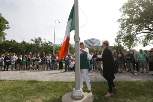 JOHN WOODS / WINNIPEG FREE PRESS Irish Ambassador to Canada Dr. Ray Basset joined Marianne Murphy and 150 Winnipeggers to raise the Irish flag over Memorial Park during a 1916 Easter Rising Commemoration and Flag Raising Ceremony Sunday, May 22, 2016. The ceremony was organized by the Irish Association of Manitoba to commemorate the 100 year anniversary of what has become known as the Easter Rising and the opening act in the war for Irish Independence.