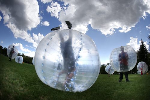 JOHN WOODS / WINNIPEG FREE PRESS Youth from Ma Mawi Wi Chi Itata Centre and from three youth centres in Kingston play Bubble Ball in Kildonan Park Monday, May 23, 2016. The youth came together for a week as part of a YMCA youth cultural exchange to expose youth from different parts of the country to eachother.