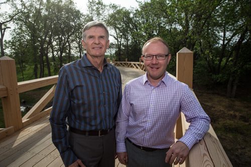 MIKE DEAL / WINNIPEG FREE PRESS (from Left) Dan Vallance Operations Chair at Niakway Country Club and Wade Nybakken the GM and Directory of Golf at Niakwa Country Club on their new foot bridge. The Players Cup golf tournament is going to be held at Niakwa Country Club July 7-10, 2016. 160525 - Wednesday, May 25, 2016