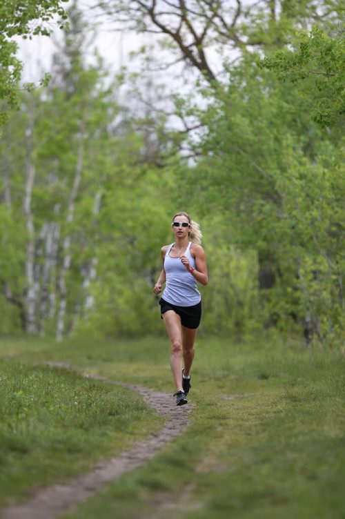 WAYNE GLOWACKI / WINNIPEG FREE PRESS   49.8 Training Basket. Nicole Walker trains for the Ironman Triathlon twice a day. She running on a  trail in Birds Hill Provincial Park.   Scott Billeck story May 25   2016