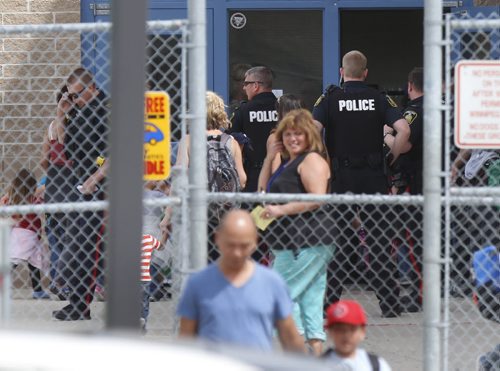 WAYNE GLOWACKI / WINNIPEG FREE PRESS     Winnipeg Police at the Prairie Rose School at 105 Lucas Ave. Wednesday morning.     May 25   2016