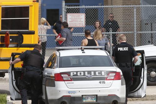 WAYNE GLOWACKI / WINNIPEG FREE PRESS    Winnipeg Police at the Prairie Rose School at 105 Lucas Ave. Wednesday morning.     May 25   2016