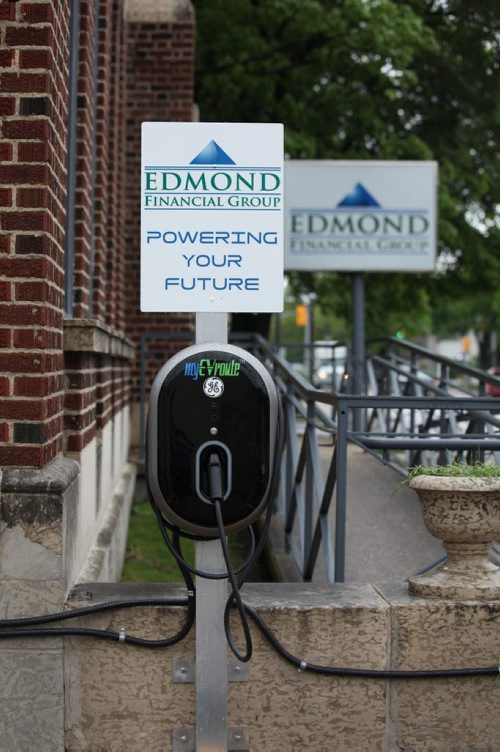 RUTH BONNEVILLE / WINNIPEG FREE PRESS  BIZ - Paul Edmond, CEO of Edmond Financial, has installed a pair of electronic car charger stations outside his building on Academy Road at a cost of $25,000. The spots are open for charging your electric car for free between the hours of 6pm and 2am.   He says there are only a handful of E-cars in the province but it's a chicken and egg argument. Nobody will buy them if there's nowhere to charge them.  May 26,  2016