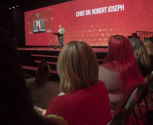 DAVID LIPNOWSKI / WINNIPEG FREE PRESS  The audience sporting red clothing and hair in this case watch the key note by Chief Dr. Robert Joseph during the opening of the 2016 Liberal Biennial Convention at RBC Convention Centre Thursday May 25, 2016.
