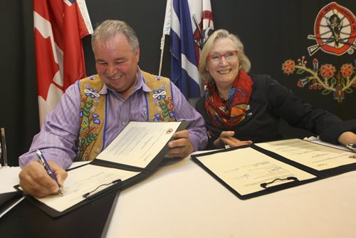 JOE BRYKSA / WINNIPEG FREE PRESS   A historic signing today between The Manitoba Metis Federation and the Federal government occurred in Winnipeg between Manitoba Metis Federation President David Chartrand and Federal Minister of Indigenous and Northern Affairs Carolyn Bennett- The signing of the Memorandum of Understanding will explore talks on reconciliation with the Manitoba Metis Community- May 27 , 2016.(see Alex Paul  story)