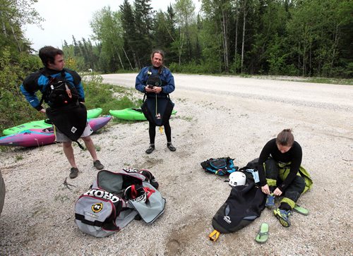 PHIL HOSSACK / WINNIPEG FREE PRESS -  PHOTOSTORY -  Left to right, Steven Walker, Bradley Kulbaba and Lori Neufeld  dress for "immersion" near their "put in" to run "The Bird" as paddlers call the Bird River whitewater sections east of Lac Du Bonnet. May 26, 2016