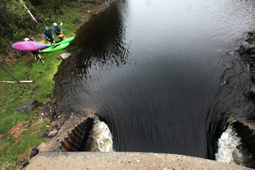 PHIL HOSSACK / WINNIPEG FREE PRESS -  PHOTOSTORY -  Left to right, Lori Neufeld, Steven Walker and Bradley Kulbaba prep their boats and gear to enter "The Culvert" as they prep to to run "The Bird. May 26, 2016