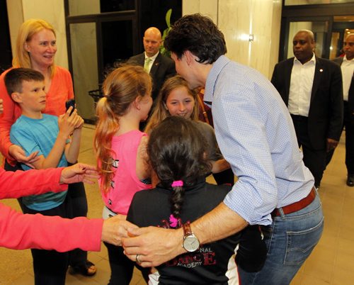 BORIS MINKEVICH / WINNIPEG FREE PRESS Canadian Prime Minister Justin Trudeau leaves the Delta after being at the Liberal convention. A group of young dancers from Thunder Bay waited forever in the cold to get a hug and photo of him. May 27, 2016.