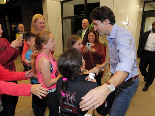 BORIS MINKEVICH / WINNIPEG FREE PRESS Canadian Prime Minister Justin Trudeau leaves the Delta after being at the Liberal convention. A group of young dancers from Thunder Bay waited forever in the cold to get a hug and photo of him. May 27, 2016.