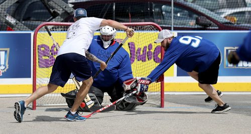 TREVOR HAGAN / WINNIPEG FREE PRESS Kyle Gallant makes a save for his team, Four Points by Sheraton Winnipeg South as they went on to defeat the True North Foundation team during the Play On 4 on 4 street hockey tournament at the University of Manitoba, Saturday, May 28, 2016.