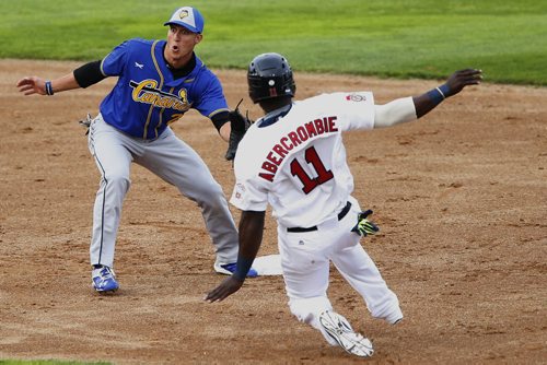 JOHN WOODS / WINNIPEG FREE PRESS Winnipeg Goldeyes Reggie Abercrombie (11) steals second from Sioux Falls Canaries Jerome Pena (2) at the Goldeyes home opener Monday, May 30, 2016.