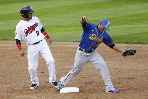 JOHN WOODS / WINNIPEG FREE PRESS Winnipeg Goldeyes Malkol Gonzalez (3) gets tagged out at the Goldeyes home opener by Sioux Falls Canaries Jerome Pena (2) Monday, May 30, 2016.