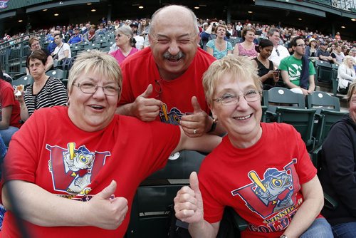 JOHN WOODS / WINNIPEG FREE PRESS Jacquie and Ivan Hudson with Lillian Bilynsky get pumped up for the Winnipeg Goldeyes home opener against the Sioux Falls Canaries Monday, May 30, 2016.