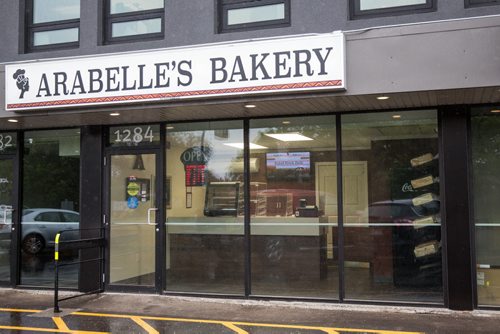 MIKE DEAL / WINNIPEG FREE PRESS Bryan and Temi Akindipe are both from Nigeria - they met in Winnipeg about 10 years ago, while studying nursing at U of M. After getting married, Bryan missed the Agege bread he grew up with in Nigeria so he started fooling around in the kitchen, trying to recreate the bread his grandmother used to make. After nailing it, friends and family told him he should market it - not only to ex-pat Africans but Canadians, too. So he and his wife opened their own place in February, Arabelle's Bakery, 1284 Archibald Street. 160601 - Wednesday, June 01, 2016